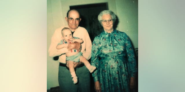 An early picture of Brandon with his maternal grandparents.