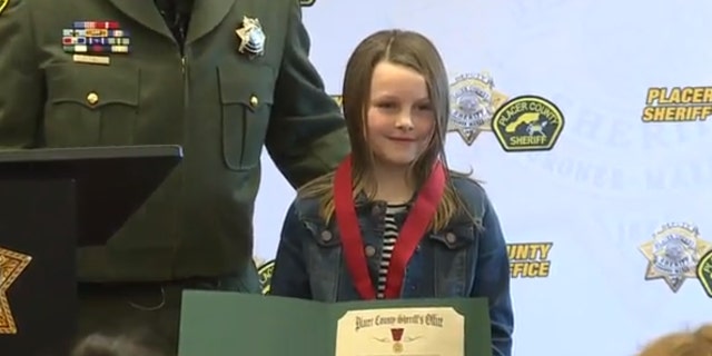 Isabell Pierce was presented with a Citizen's Medal of Merit for her heroism during the shooting spree on Jan. 15.