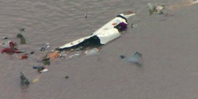 Flight 3591 was spotted by witnesses just before 1 p.m. diving "nose first" into Trinity Bay, officials said.