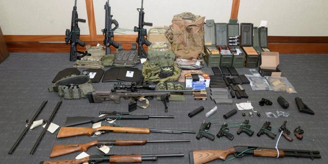 Prosecutors say these firearms and ammunition were found in Coast Guard Lt. Christopher Hasson's Maryland apartment.