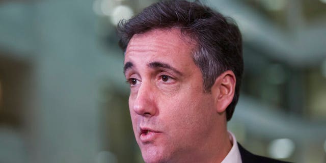 Michael Cohen, President Donald Trump's former lawyer, speaks to the media as he departs after testifying before a closed door hearing of the Senate Intelligence Committee on Capitol Hill, Tuesday, Feb. 26, 2019, in Washington. (AP Photo/Alex Brandon)