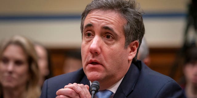 Michael Cohen, President Donald Trump's former personal lawyer, becomes emotional as he finishes a day of testimony to the House Oversight and Reform Committee, on Capitol Hill in Washington, Wednesday, Feb. 27, 2019. (AP Photo/J. Scott Applewhite)