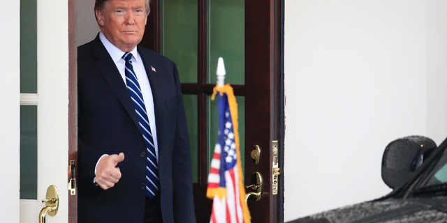 President Donald Trump gestures as visiting Austrian Chancellor Sebastian Kurz leaves the White House in Washington following their meeting, Wednesday, Feb. 20, 2019. (AP Photo/Manuel Balce Ceneta)