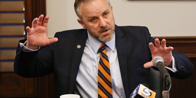Oklahoma state Sen. Greg Treat, R- Oklahoma City, President Pro Tempore, answers a question during a news conference Monday, Feb. 25, 2019, in Oklahoma City. Treat is the sponsor of a bill in which Oklahoma would automatically ban abortions if the U.S. Supreme Court overturns its landmark 1973 ruling that legalized abortion nationwide. (AP Photo/Sue Ogrocki)