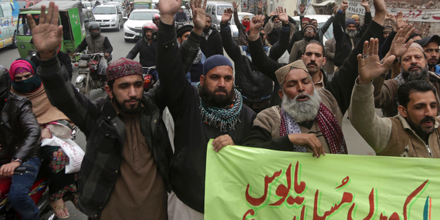 Activists from the Pakistani religious party Sunni Threek protest the Supreme Court's decision to uphold the acquittal of Aasia Bibi, in Lahore, Pakistan, Wednesday, Jan. 30, 2019.