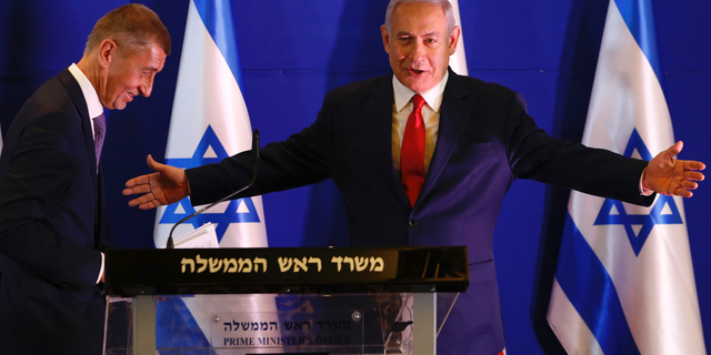 Czech Republic's Prime Minister Andrej Babis, left, Israeli Prime Minister Benjamin Netanyahu attend a press conference after their meeting in Jerusalem, Tuesday, Feb. 19, 2019. (AP Photo/Ariel Schalit, Pool)