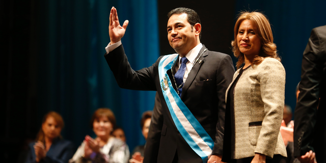 FILE - In this Jan. 14, 2016 file photo, first lady Hilda Patricia Marroquin de Morales accompanies her husband Guatemalan President Jimmy Morales, at the National Theater in Guatemala City. Guatemala’s chief prosecutor announced on Friday, Feb. 22, 2019 that her office has initiated an investigation of alleged corruption against the first lady. (AP Photo/Moises Castillo, File)