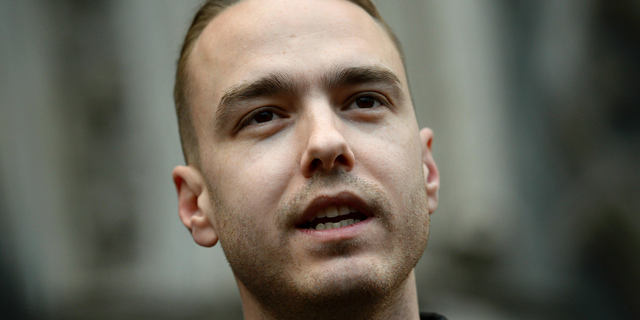 David Challen, son of Georgina Challen, known as Sally, speaks outside the High Court in London, Thursday, Feb. 28, 2019. A British court has overturned the conviction of a woman serving a life sentence for murder for killing her husband. Sally Challen was convicted in 2011 of killing her husband Richard with a hammer. Three Court of Appeal judges have ordered a retrial, saying Challen was suffering from two mental disorders at the time of the killing. (Kirsty O'Connor/PA via AP)