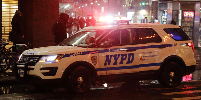In this Wednesday, Feb. 20, 2019, photo, a police vehicle responds in New York. That long, droning police and ambulance siren that has become part of the soundtrack of New York City for generations could be changing. A pair of city lawmakers has proposed switching to the high-low, European-style wail heard on the streets of London and Paris. (AP Photo/Frank Franklin II)