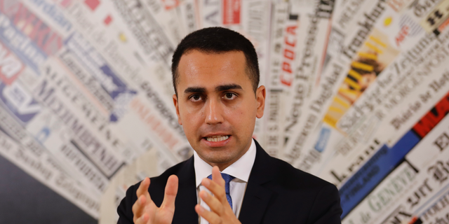 FILE - In this Nov.9, 2018 file photo, Italian deputy Premier and Labor Minister Luigi Di Maio talks to reporters during a press conference at the Foreign Press Association headquarters, in Rome. France is recalling its ambassador to Italy amid mounting tensions, after Di Maio met with French yellow vest protesters and offered to support their anti-government movement. (AP Photo/Andrew Medichini, File)