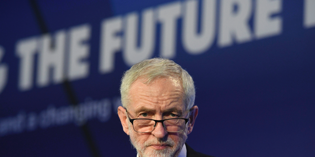 Britain's main opposition Labour Party leader Jeremy Corbyn speaks during the annual conference of the EEF manufacturers organisation at the Queen Elizabeth II Conference Centre in London, Tuesday Feb. 19, 2019. Seven British lawmakers quit the Labour Party on Monday over its approach to Brexit and alleged anti-Semitism, the biggest shake-up in years for one of Britain's major political parties. (Stefan Rousseau/PA via AP)