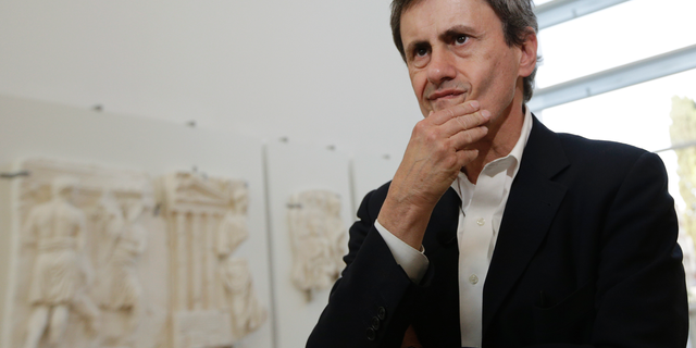 FILE - In this May 21, 2013 file photo former Rome Mayor Gianni Alemanno stands during a photo opportunity in Rome. Former Rome mayor has been convicted Monday Feb. 25, 2019 by a Rome court in a corruption and illegal financing case and sentenced to 6 years in prison. (AP Photo/Andrew Medichini, File)