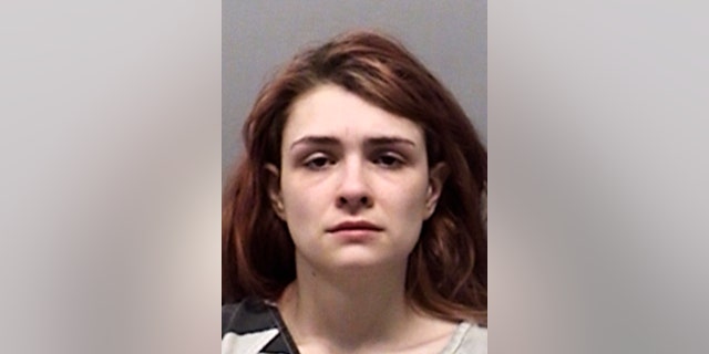 This undated photo provided by the From Wise County Sheriff’s Office shows Paige Isabow Harkings. Deputies on Tuesday, Feb. 12, 2019, discovered two malnourished children crammed into a locked dog cage and two more smeared with feces and urine in a barn in North Texas, in what a sheriff described as the worst case of child abuse he has ever seen. Joseph Fabila and Harkings, the mother of the four children, have been jailed without bond after the children were found at their rural home. (From Wise County Sheriff’s Office via AP)