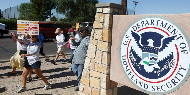 This June 2018 photo shows protesters outside the El Paso Processing Center in El Paso, Texas. (Rudy Gutierrez/The El Paso Times via AP, File)
