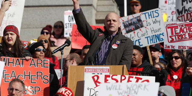 Ron Ruggiero, president of the Service Employees International Union Local 105, speaks to striking Denver teachers during a strike rally on the west steps of the State Capitol Monday, Feb. 11, 2019, in Denver. The strike is the first for teachers in Denver since 1994 and centers on base pay. (AP Photo/David Zalubowski)
