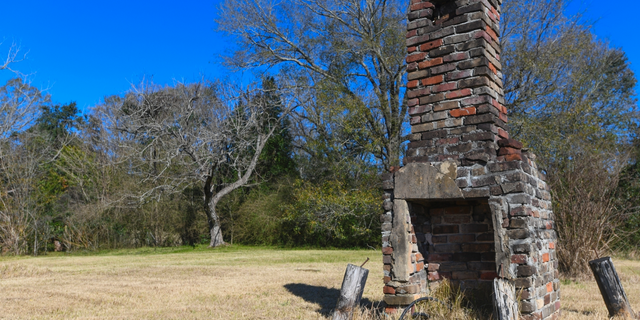 This fireplace at Africatown, Mobile, Alabama, is the last original structure dating back to the time when Clotilda survivors lived in the area. (AP Photo / Julie Bennett)