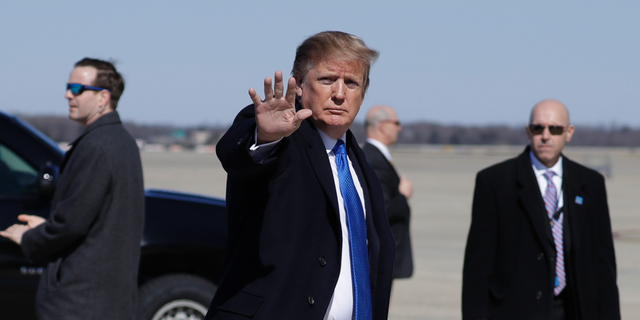 President Donald Trump walks to board Air Force One for a trip to Vietnam to meet with North Korean leader Kim Jong Un, Monday, Feb. 25, 2019, in Andrews Air Force Base, Md. (AP Photo/ Evan Vucci)