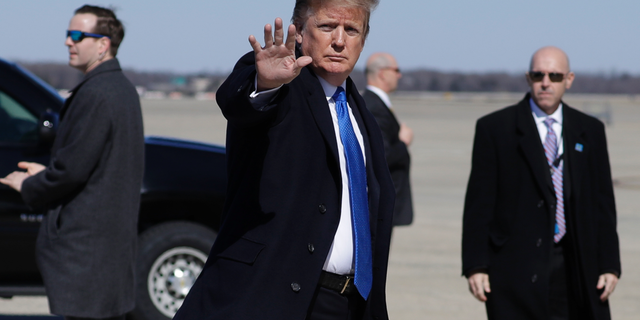 President Donald Trump walks to board Air Force One for a trip to Vietnam to meet with North Korean leader Kim Jong Un, Monday, Feb. 25, 2019, in Andrews Air Force Base, Md. (AP Photo/ Evan Vucci)