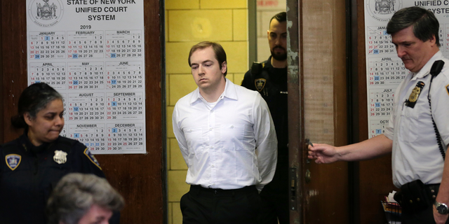 James Jackson appears in court for sentencing in New York, Wednesday, Feb. 13, 2019. Jackson, a white supremacist, pled guilty to killing a black man with a sword as part of a racist plot that prosecutors described as a hate crime and was sentenced to life in prison without parole. (AP Photo/Seth Wenig)