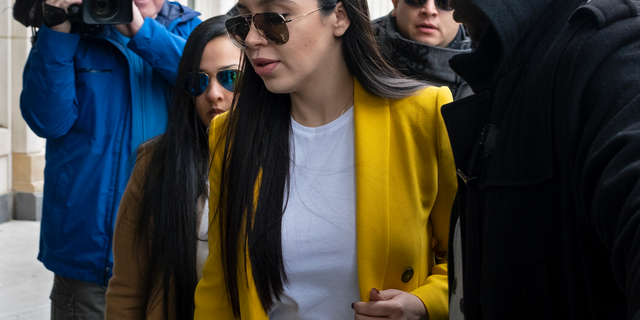 Emma Coronel Aispuro, center, wife of Joaquin "El Chapo" Guzman, arrives at federal court, Monday, Feb. 11, 2019, in New York. A jury is deliberating at the U.S. trial of the infamous Mexican drug lord. (AP Photo/Craig Ruttle)