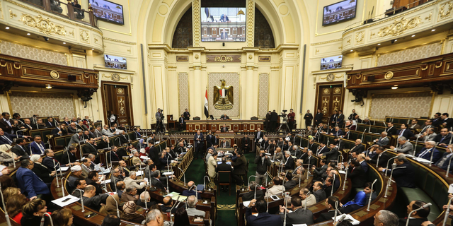 Egypt's Parliament meets to deliberate over constitutional amendments that could allow President Abdel-Fattah el-Sissi to stay in office till 2034, in Cairo Egypt, Wednesday, Feb 13, 2019. Wednesday's session will lead to a vote later in the evening or on Thursday, after which the text of the amendments would be finalized by a special committee for a final decision within two months. El-Sissi's current second term expires in 2022. (AP Photo)