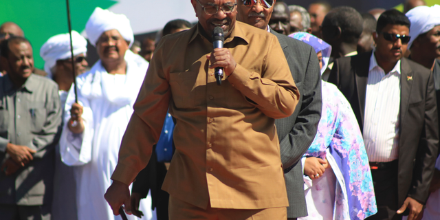 FILE - In this Jan. 9, 2019 file photo, Sudan's President Omar al-Bashir addresses supporters at a rally in Khartoum, Sudan. On Tuesday, Feb 12, 2019, hundreds of demonstrators are gathering in different Sudanese cities, protesting against autocratic al-Bashir. The demonstrations, were called by the Sudanese Professionals Association, an umbrella of independent professional unions. Video footage shows demonstrators gathering at intersections chanting "just fall," and calling for a "people's revolution." (AP Photo/Mahmoud Hjaj, File)