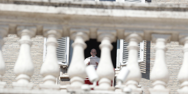 Pope Francis delivers his message during the Angelus noon prayer in St. Peter's Square at the Vatican, Sunday, Feb. 17, 2019. The pontiff is asking for prayers for this week's sex abuse summit at the Vatican, calling abuse an "urgent challenge of our time." (AP Photo/Gregorio Borgia)