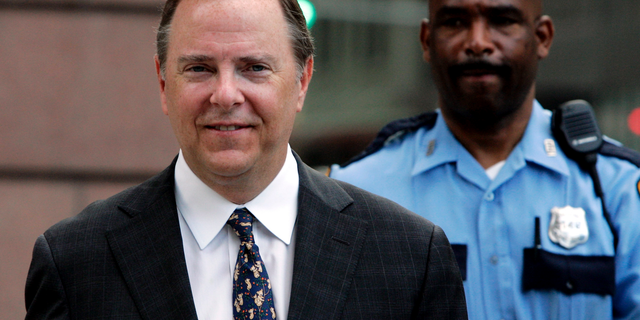 FILE - In this Monday, April 17, 2006 file photo, former Enron executive Jeffrey Skilling is escorted to the federal courthouse for his first day of cross examination in his fraud and conspiracy trial in Houston. ormer Enron Corp. CEO Jeffrey Skilling has been released from federal custody, Thursday, Feb. 21, 2019. His discharge comes after serving 12 years in prison and six months in a halfway house for his actions that led to one of the worst corporate meltdowns in history. (AP Photo/Pat Sullivan, File)