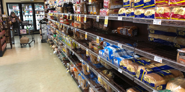 FILE- This Feb. 7, 2019, file photo shows the bread section of a Safeway store in Tacoma, Wash. On Wednesday, Feb. 13, 2019, the Labor Department reports on U.S. consumer prices for January. (AP Photo/Ted S. Warren, File)