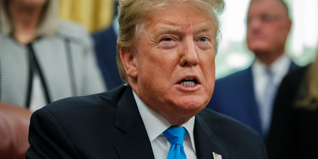 President Donald Trump speaks during a signing event for "Space Policy Directive 4" in the Oval Office of the White House, Tuesday, Feb. 19, 2019, in Washington. (AP Photo/ Evan Vucci)
