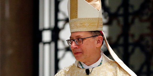FILE - This Jan. 12, 2018, file photo shows Bishop Barry Knestout during his installation as the 13th bishop of the Catholic Diocese of Richmond at the Cathedral of the Sacred Heart in Richmond, Va. Virginia's Catholic Diocese of Richmond on Wednesday, Feb. 13, 2019, published a list of 42 priests with a "credible and substantiated" allegation of sexual abuse against a child. (Mark Gormus/Richmond Times-Dispatch via AP, File)