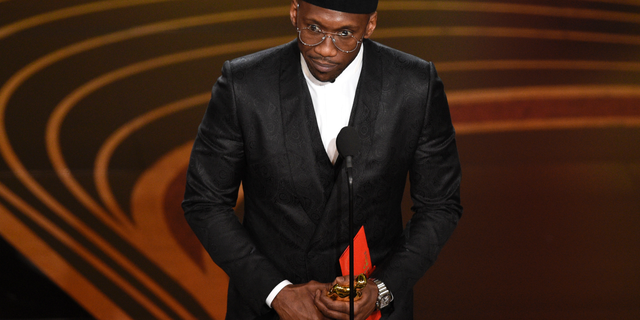 Mahershala Ali accepts the award for best performance by an actor in a supporting role for "Green Book" at the Oscars on Sunday, Feb. 24, 2019, at the Dolby Theatre in Los Angeles.