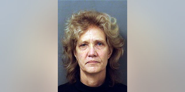 This undated photo provided by the Palm Beach County Sheriff's Office shows Amy Elizabeth Fleming, 60, of Dania, Fla. Fleming, who moved to Florida from the Las Vegas area a year after her 3-year-old mysteriously vanished more than 30 years ago, has been arrested on a warrant charging her with killing the boy, authorities said Monday, Feb. 11, 2019. (Palm Beach County Detention Center/Palm Beach County Sheriff's Office via AP)