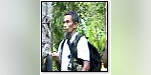 This photo provided by Philippine National Police (PNP), shows militant Abu Sayyaf Group leader Hatib Hajan Sawadjaan in the PNP confidential report. Philippine and U.S. official say a little known militant has been named the new leader of the Islamic State group in the southern Philippines. The Philippine interior secretary says the rise of Hatib Sawadjaan, who is blamed for orchestrating a suicide bombing in a cathedral last month that killed 23 people on Jolo Island, shows that ISIS would latch on desperately to any militant who could provide a sanctuary and armed fighters as its last strongholds crumble in Syria. (Philippine National Police via AP)