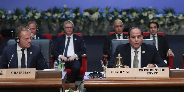 European Council President Donald Tusk, left, and Egypt's President Abdel-Fattah El-Sisi, right, attend a round table meeting at an EU-Arab summit at the Sharm El Sheikh convention center in Sharm El Sheikh, Egypt, Sunday, Feb. 24, 2019. Leaders from European Union and Arab League countries are holding their first-ever summit, meeting in the Egyptian resort city of Sharm el-Sheikh to discuss migration, security and business deals. (AP Photo/Francisco Seco)