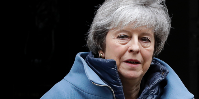 Britain's Prime Minister Theresa May leaves 10 Downing Street in London, Tuesday, Feb. 12, 2019. May is expected to address Parliament on Brexit later Tuesday, followed by a debate. (AP Photo/Kirsty Wigglesworth)