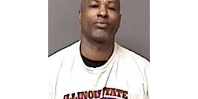 This undated booking photo provided by the Aurora Illinois Police Department shows Gary Montez Martin, who police say killed multiple people at a suburban Chicago manufacturing warehouse after he was fired, Friday, Feb. 15, 2019. (Aurora Illinois Police Department via AP)