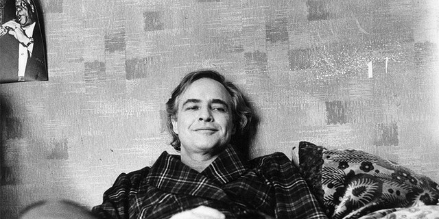 American actor Marlon Brando relaxing on the set of "The Last Tango in Paris."