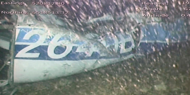 In this image released Monday, Feb. 4, 2019, by the UK Air Accidents Investigation Branch (AAIB) showing the rear left side of the fuselage including part of the aircraft registration N264DB that went missing carrying soccer player Emiliano Sala, when it disappeared from radar contact on Jan. 21 2019.