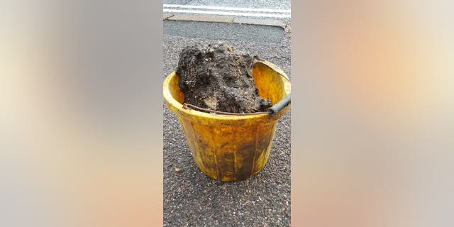 The first chuck of the 210-foot “fatberg” in Sidmouth, England was brought to the surface as sewer workers began their mammoth task of removing it.