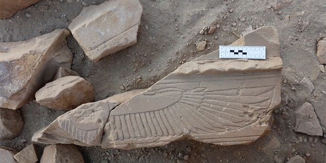 Fragment of a winged solar disk discovered in the ancient quarry. (Gebel el Silsila Project)