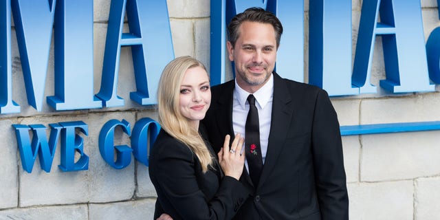 Amanda Seyfried and Thomas Sadoski arrive for the world premiere of 'Mamma Mia! Here We Go Again' at Eventim Apollo, Hammersmith in London on July 16, 2018.