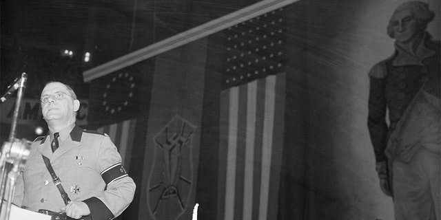 Fritz Kuhn, local Fuehrer, leader of the German American Bund, addresses the Bund's heavily guarded "Americanization" rally at Madison Square Garden.