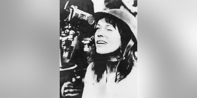 American actress and antiwar activist Jane Fonda pictured during her 1972 Vietnam trip looking though the scope of an anti-aircraft gun during her tour of the North Vietnamese capital. 