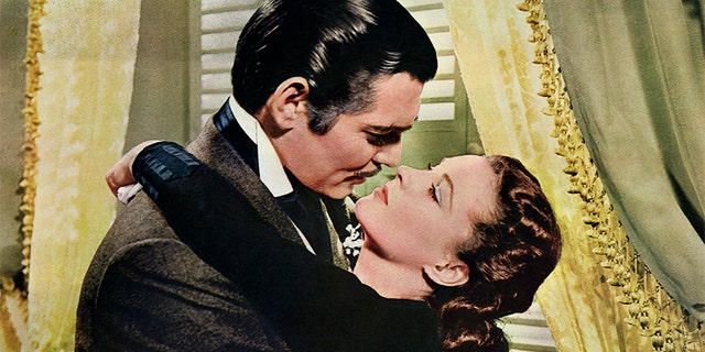 Rhett Butler (Clark Gable) embraces Scarlett O'Hara (Vivien Leigh) in a famous scene from the 1939 epic film "Gone with the Wind." — Getty
