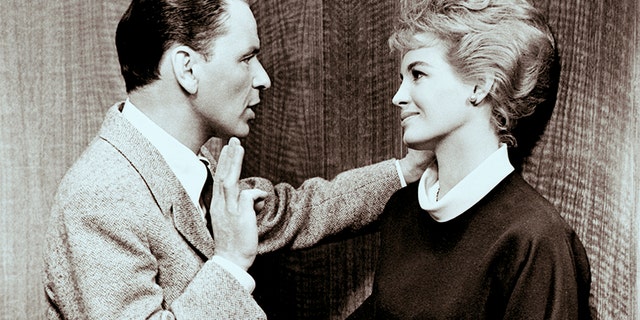 Frank Sinatra and Angie Dickinson play husband and wife in "Ocean's 11" a 1960 comedy about a plan to simultaneously rob five casinos in Las Vegas. — Getty