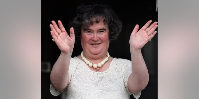 Britain's Got Talent star Susan Boyle at her front door in Blackburn, West Lothian.