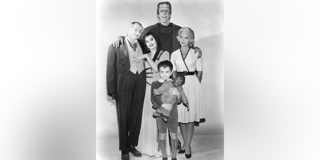 Members of the Munster family in a publicity still for Season 1 of the comedy-horror TV series
