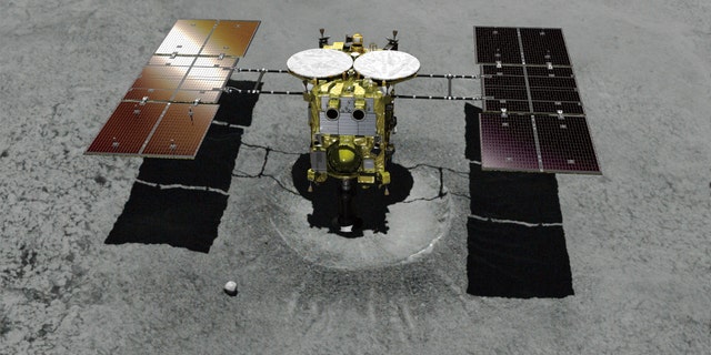 An illustration of the Japanese unmanned spacecraft Hayabusa2 approaching asteroid Ryugu.