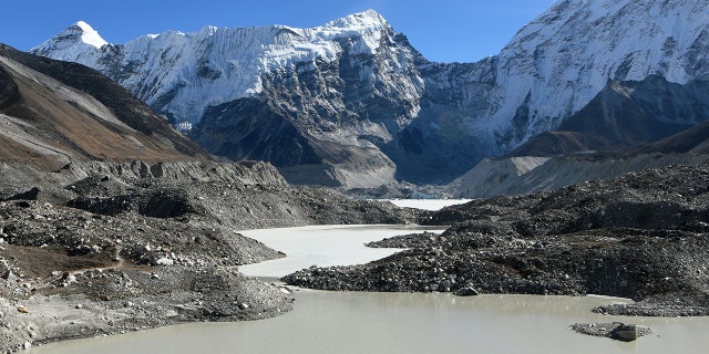 This picture taken on November 22, 2018 shows a general view of the Imja glacial lake controlled exit channel in the Everest region of the Solukhumbu district, some 140km northeast of Kathmandu. - Formed in the shadow of Mount Everest, the turquoise depths of Nepal's Imja glacial lake would be a breathtaking miracle of nature to behold -- were they not a portent of catastrophic floods. (Photo by Prakash MATHEMA / AFP) / TO GO WITH Climate-energy-UN-COP24-Nepal, FOCUS by Paavan MATHEMA (Photo credit should read PRAKASH MATHEMA/AFP/Getty Images)